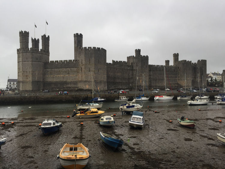 Caernarfon Castle seen from the south west across the River Seiont