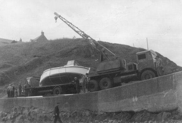 William's boat arrives at Portknockie Harbour on the back of a lorry
